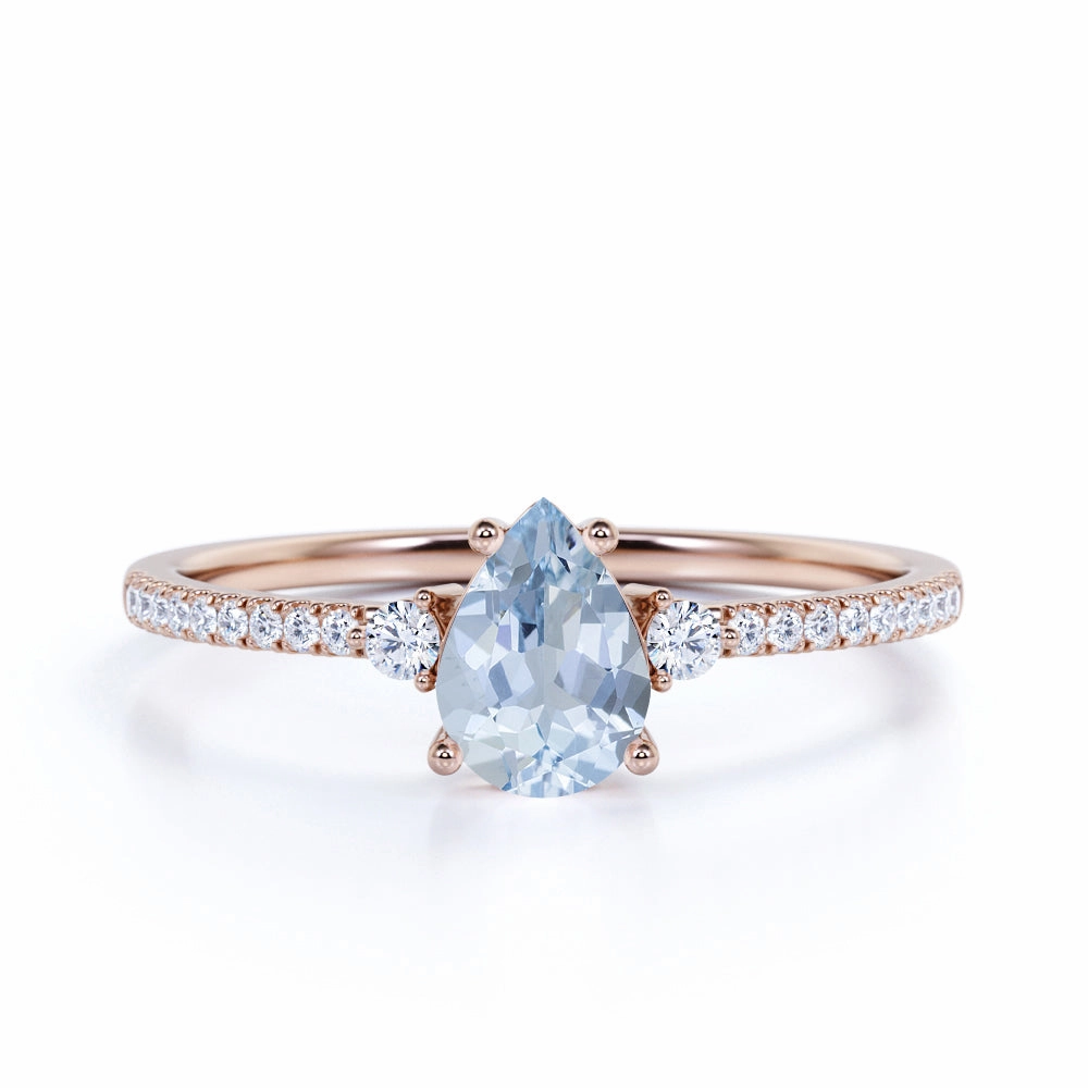 Delicate Adornment 1.25 ct Pear Shaped Aquamarine Pave Engagement Ring