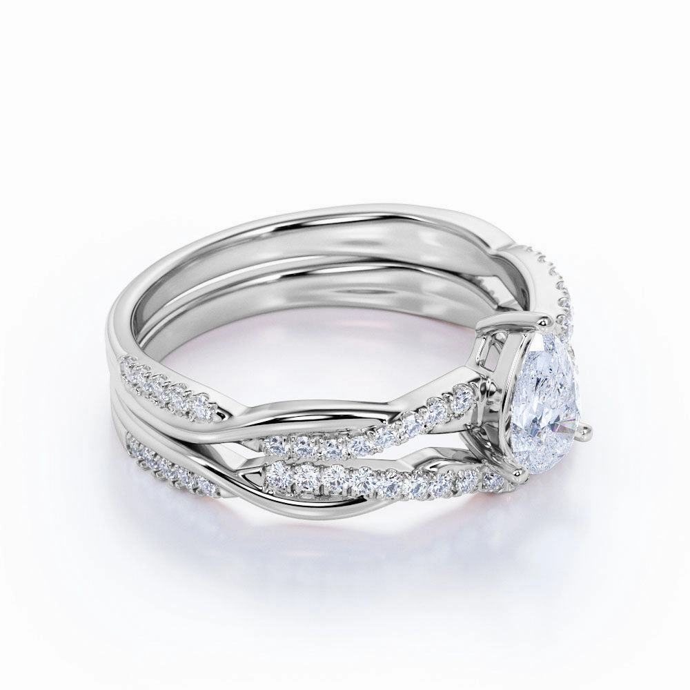 Traditional Adornment Beautiful Design 3 Prong Basket 0.83 CT TDW Pear Shaped Diamond and Infinity U Shaped Micro Pave Stylish Wedding Ring Sets