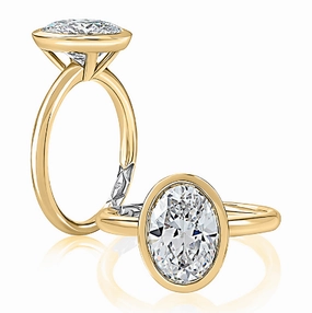 Sophisticated piece Opulent Gem A. JAFFE Oval Center Bezel Solitaire Diamond Engagement Ring Setting in 14K Yellow Gold