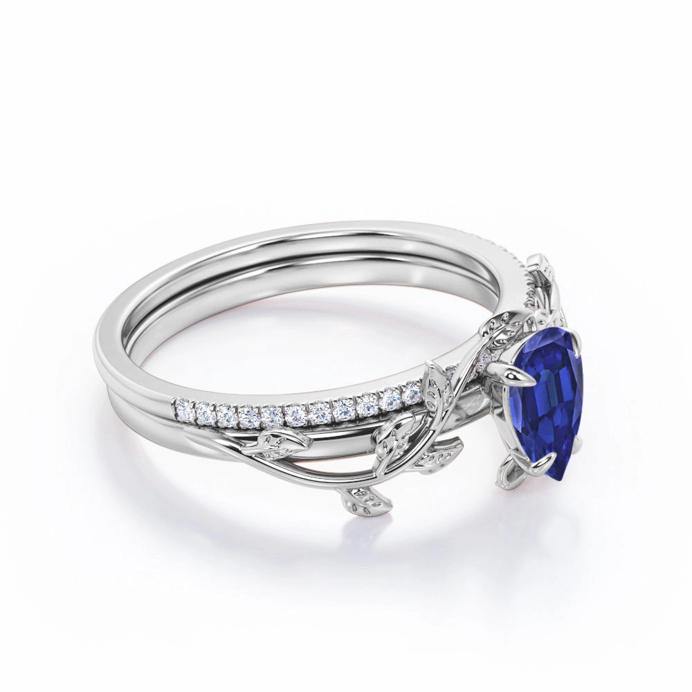 1.25 Ct Pear Cut Lab Sapphire Floral Wedding Ring Set Sophisticated Look