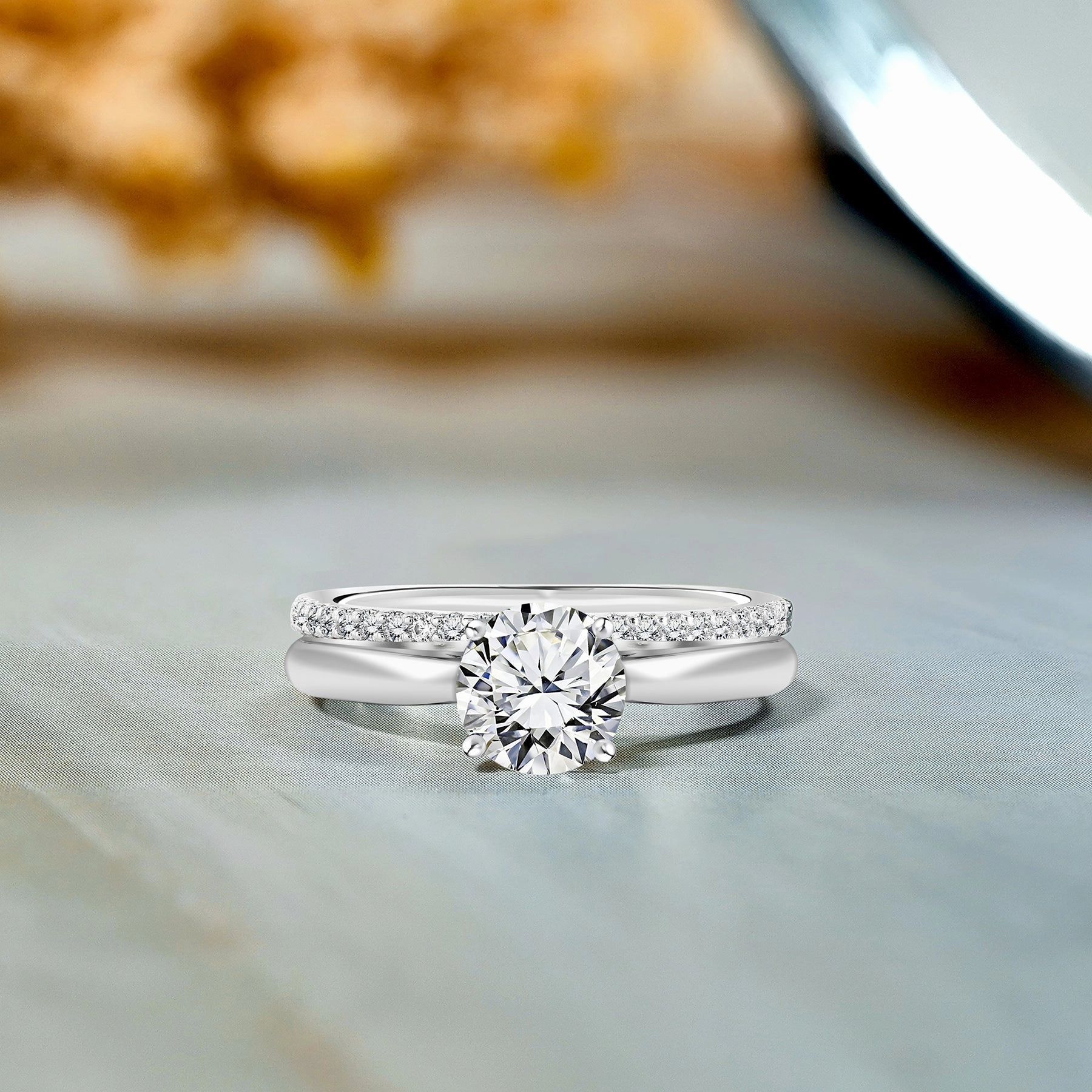 Fashionable Expression Four Prong 1.25 Carat Round Cut Moissanite Bridal Set