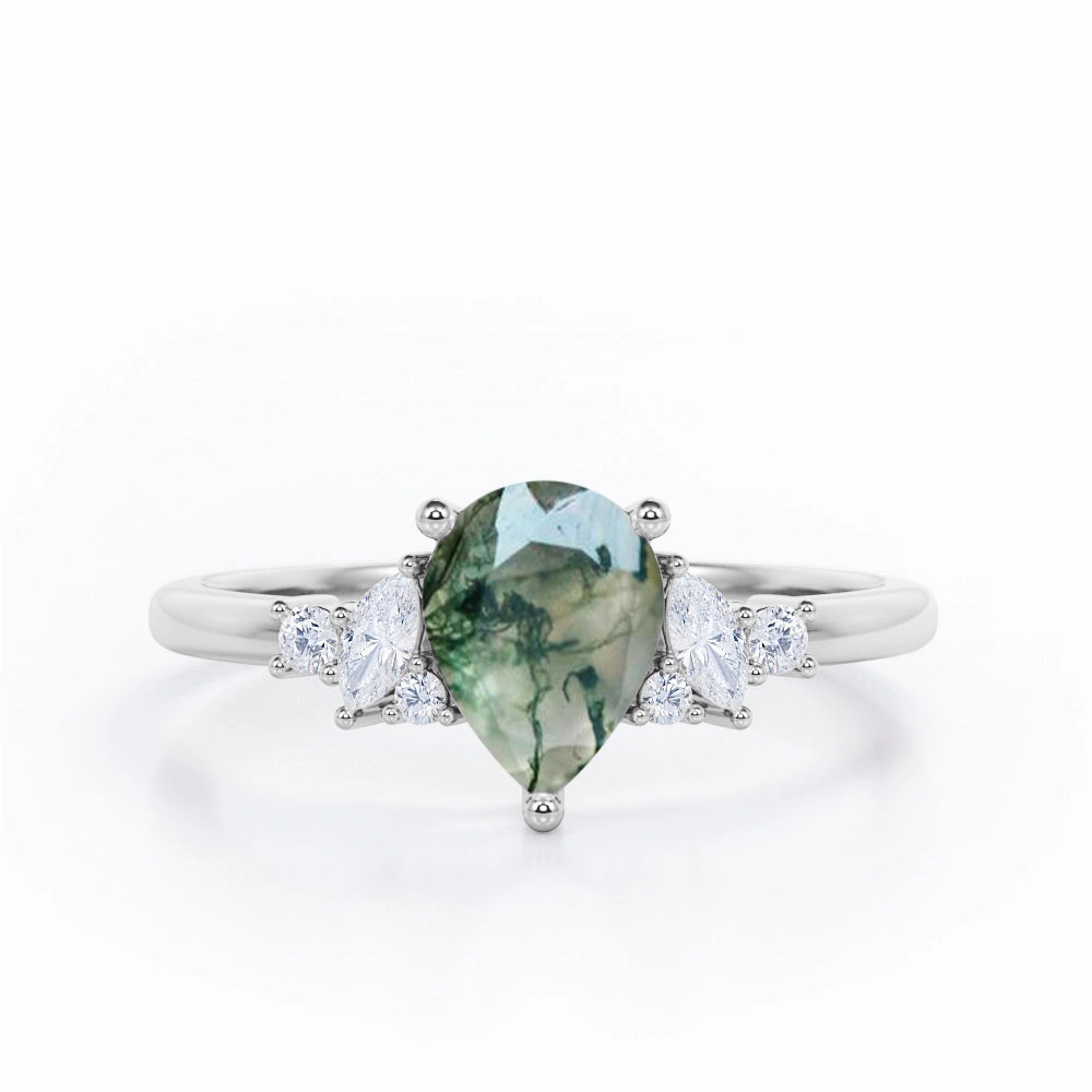 Creative Token Shimmer Touch Geometric 7 Stone 0.6 ct Pear Moss Agate Engagement Ring