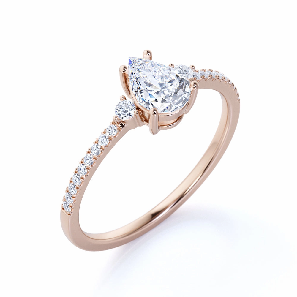 Elegant Expression Pave Set 1.50 Carat Pear Moissanite Engagement Ring