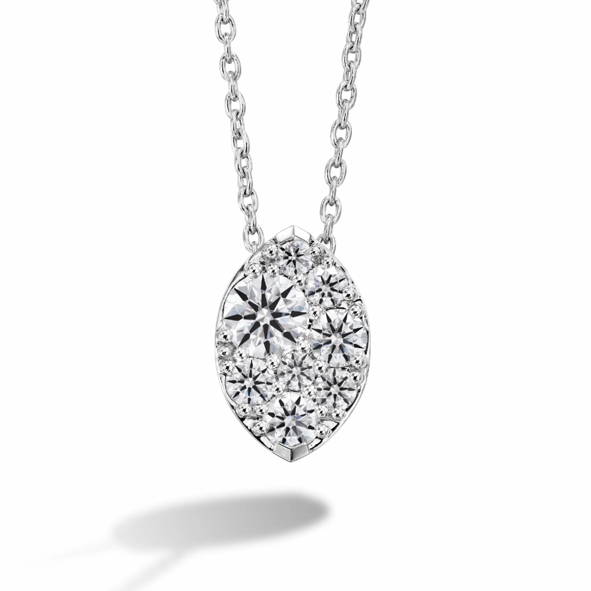 Vibrant Look Gleam Accent Hearts On Fire 18K White Gold Tessa Diamond Cluster Pendant with a 18K White Gold Link Necklace (0.30ctw)