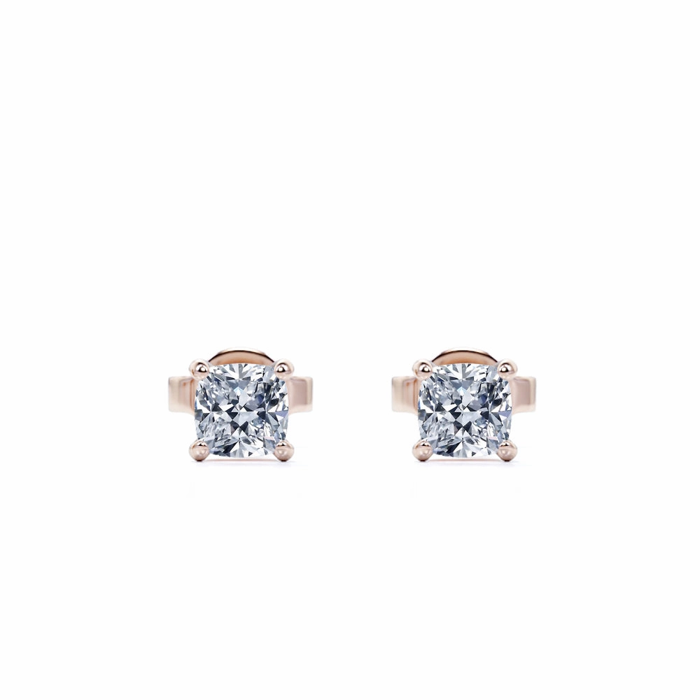 4 Prong - 0.20 Carat Cushion Cut Diamond - Solitaire Stud Earrings - 18K White Gold Plating Over Silver Pearlescent Jewelry