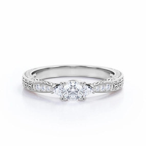 0.45 Carat Round Cut Diamond 3 Stone Engagement Ring In White Gold Branded Article Elegant Creation