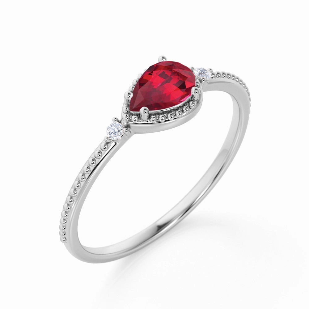 Secure Symbol Low Key 1.10 ct Pear Lab-Created Ruby 3-Stone Bezel Engagement Ring