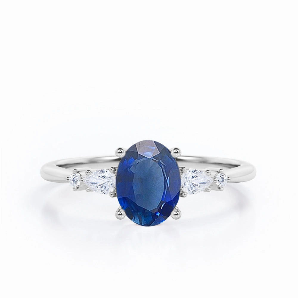 Couture Accessory Five Stone 0.6 Ct Oval Cut Lab Sapphire Engagement Ring